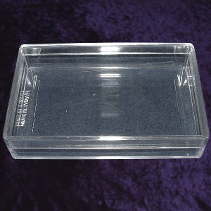 A clear plastic card box with lid for 57mm wide bridge cards Photo